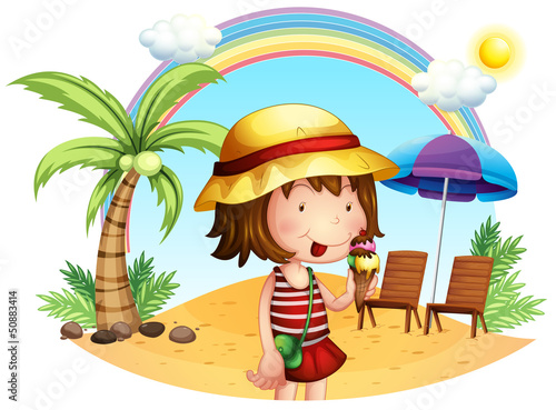 A beach with a little girl