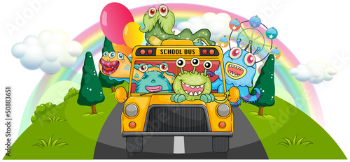 A yellow school bus with the scary monsters
