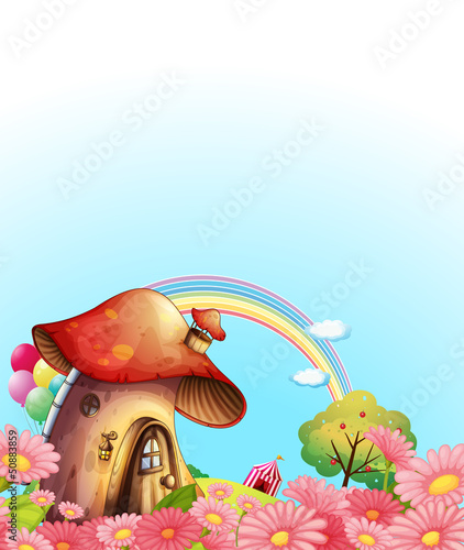 A mushroom house above the hill with a garden