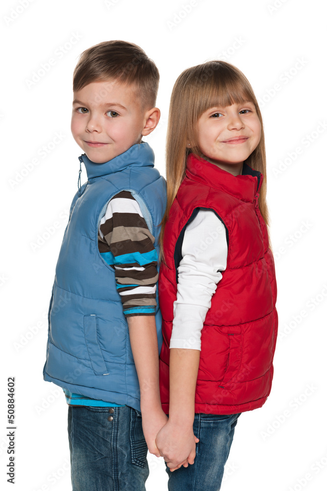 Two smiling children on the white background Two smiling children on the white background