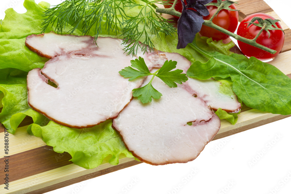 Sausages with salad and basil