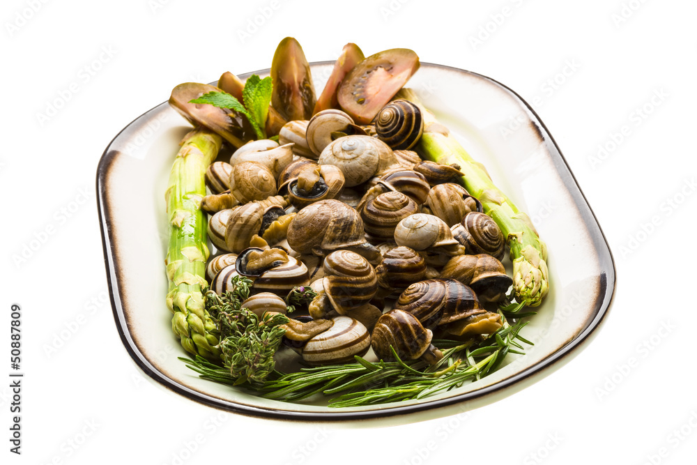 Escargot with asparagus, rosemary, thymus and tomato Escargot with asparagus, rosemary, thymus and tomato