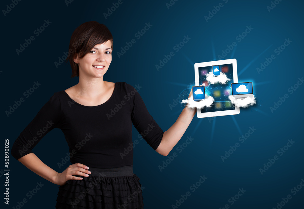 young woman holding tablet with modern devices in clouds young woman holding tablet with modern devices in clouds