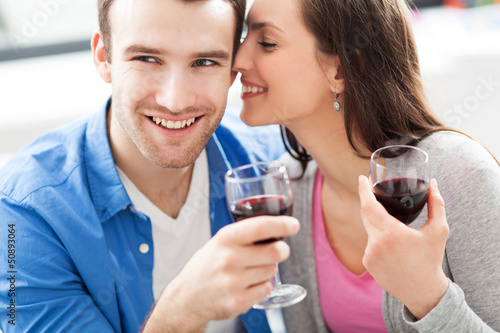 Young couple drinking wine