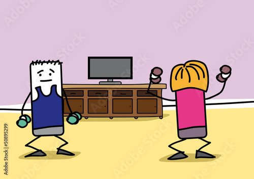 Couple qui fait du sport dans le salon
