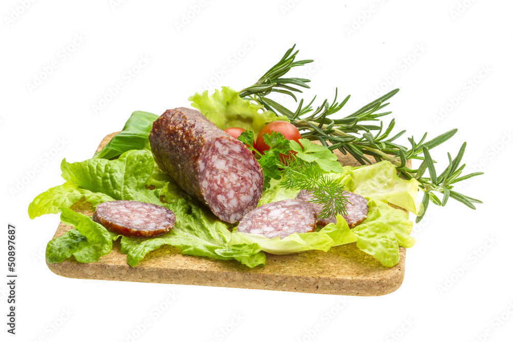 Salami with rosemary, salad and tomatoes Salami with rosemary, salad and tomatoes