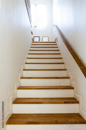 Interior - wood stairs and handrail © jannoon028