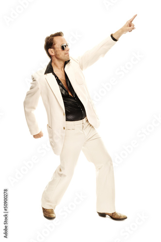 Mad disco dancer in white suit and snake leather boots