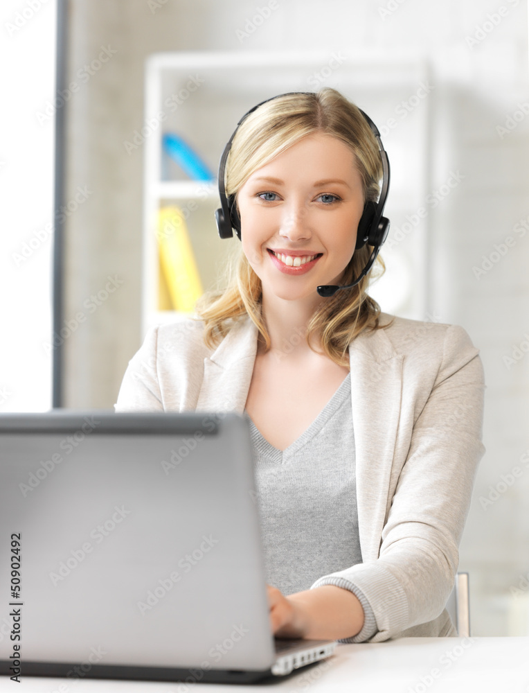 friendly female helpline operator with laptop friendly female helpline operator with laptop