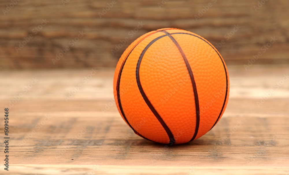 Toy basketball on wood background Toy basketball on wood background