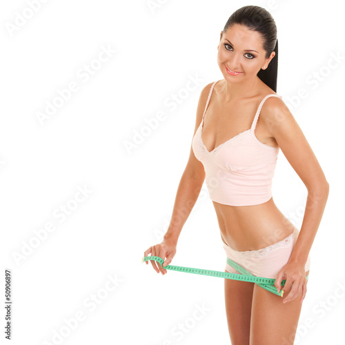 Happy woman with measure tape