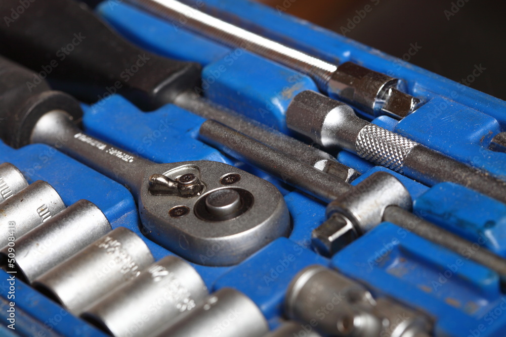 Closeup toolkit set tools in blue box Closeup toolkit set tools in blue box