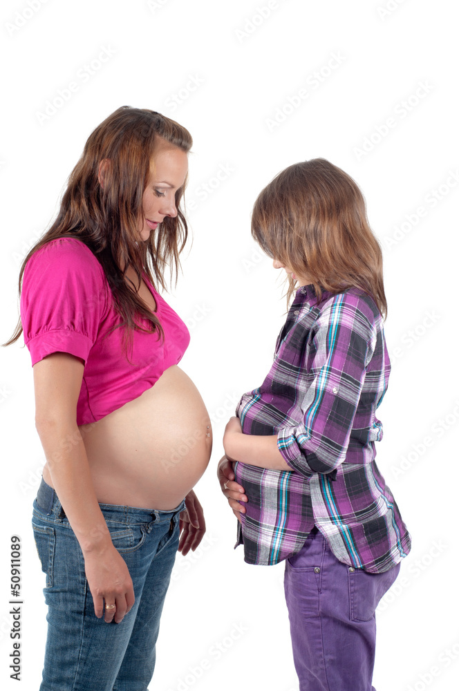 Beautiful pregnant woman with daughter Beautiful pregnant woman with daughter