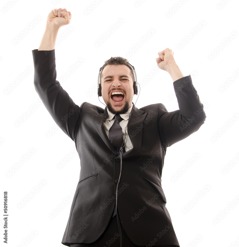 Excited suit man with headphones.