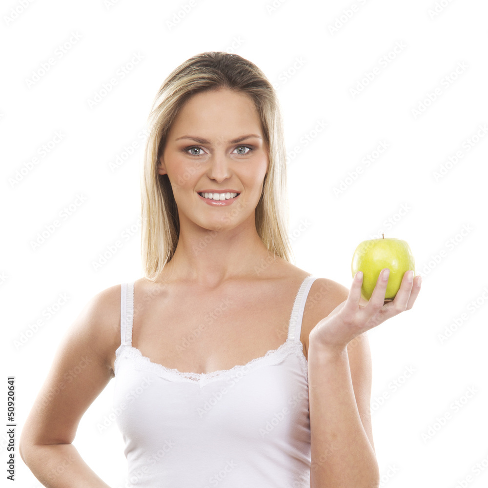 Young attractive girl with a pile of fruits and vegetables isola Young attractive girl with a pile of fruits and vegetables isola