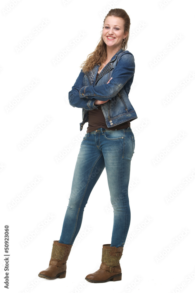 Young Woman in Jeans with Arms Crossed Young Woman in Jeans with Arms Crossed