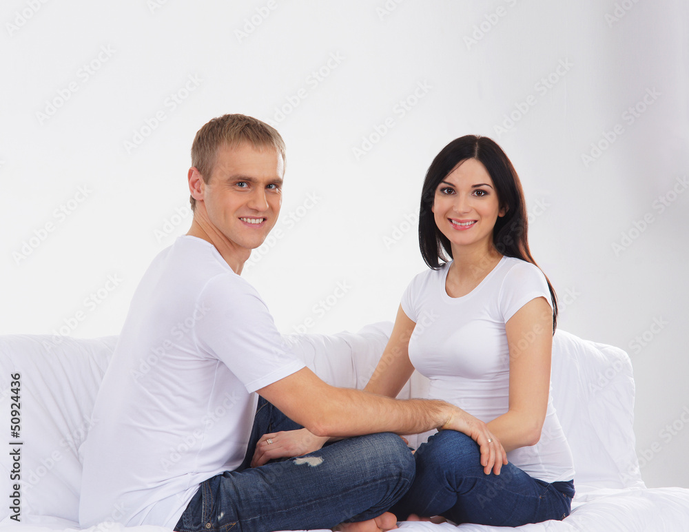 Young attractive couple: pregnant mother and happy father Young attractive couple: pregnant mother and happy father