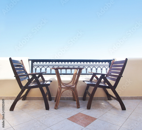 Two chairs on the balcony  Santorini resort