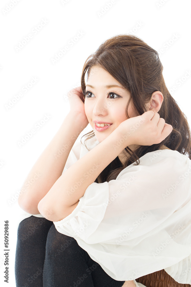 Beautiful asian woman relaxing on white background Beautiful asian woman relaxing on white background