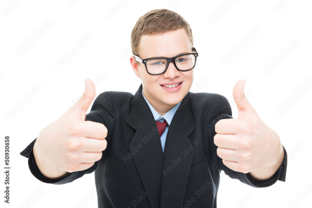 Successful young businessman showing thumbs up Successful young businessman showing thumbs up