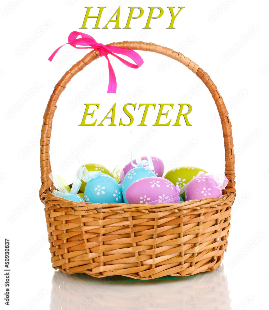 Colorful easter eggs in basket isolated on white