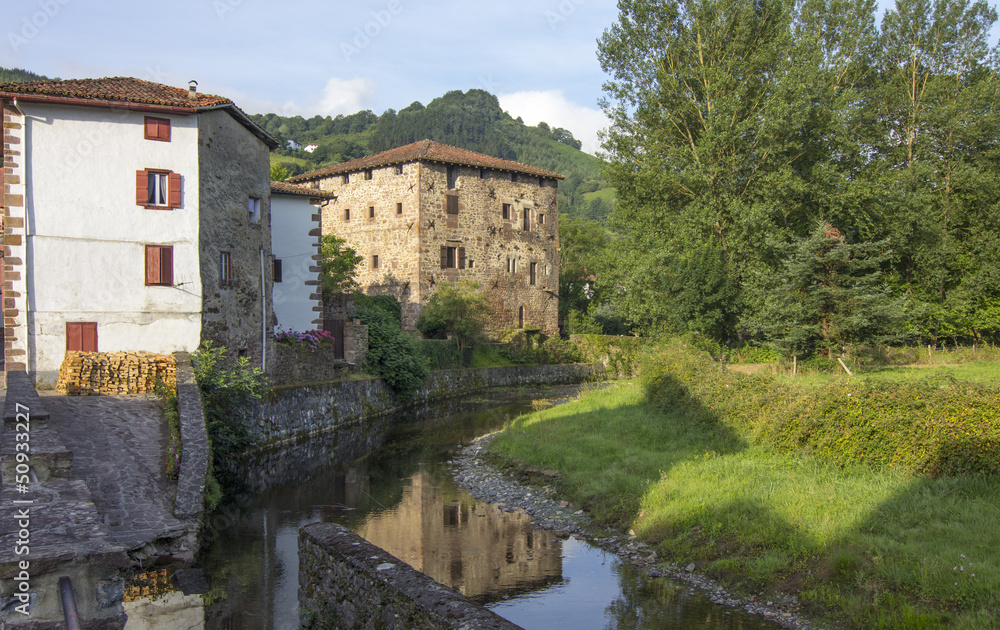 beautiful rural houses along the River in the Pyrenees, Etxalar,