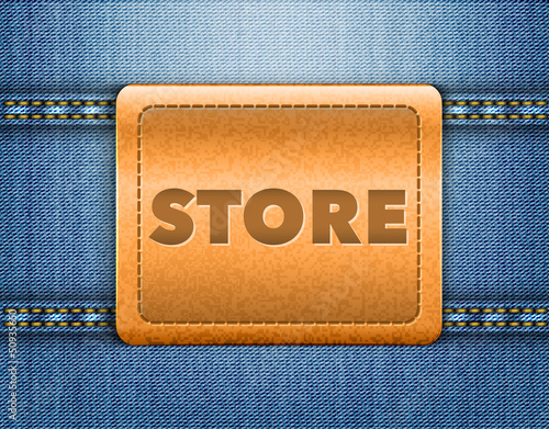 Store word on brown leather label on blue jeans background