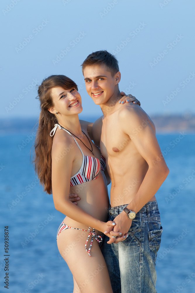Attractive couple at the sea Attractive couple at the sea