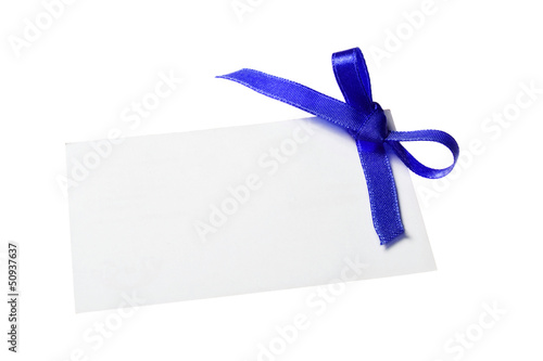 Blank gift tag tied with a bow blue red satin ribbon.