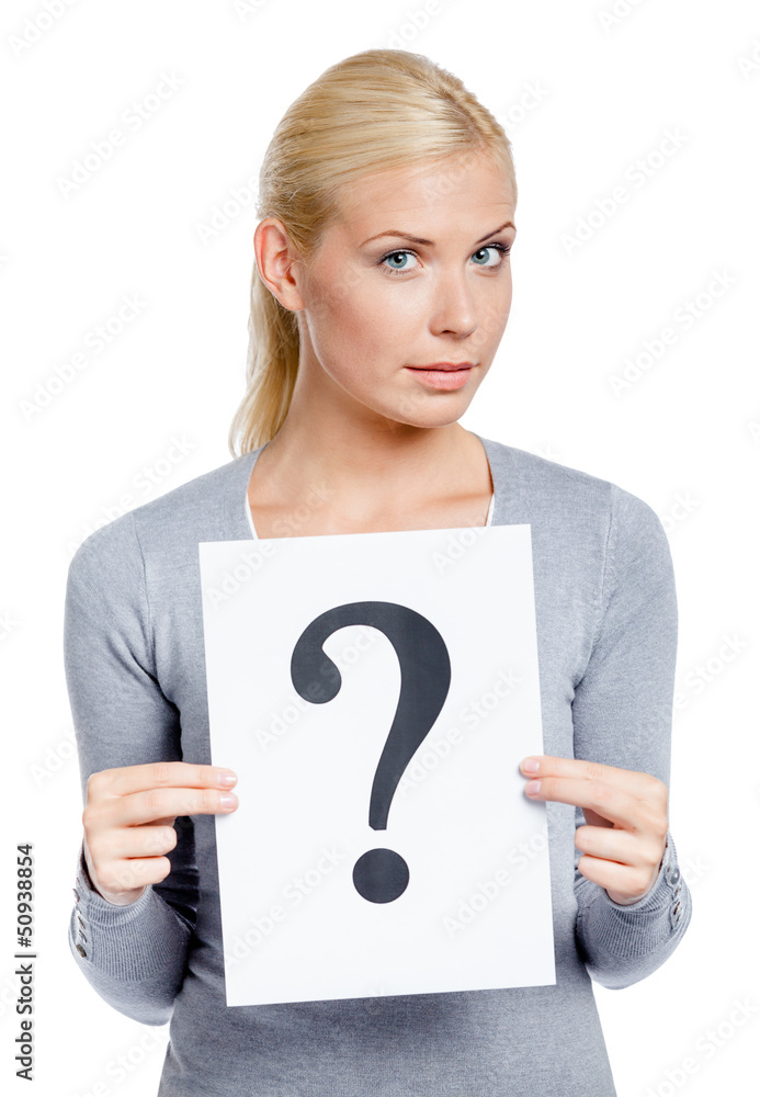 Woman in grey sweater keeps paper with question mark Woman in grey sweater keeps paper with question mark