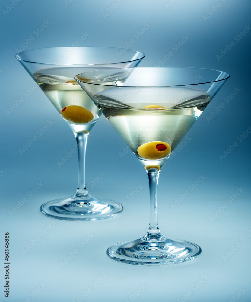 two glasses martini with olive. cocktail isolated
