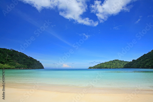 Fototapeta Naklejka Na Ścianę i Meble -  Tropical beach against blue sky in Surin Islands