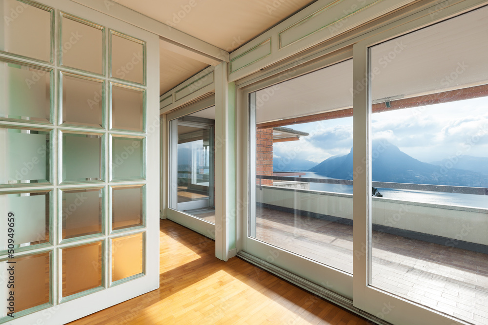 Fototapeta premium Interior, large windows overlooking the lake