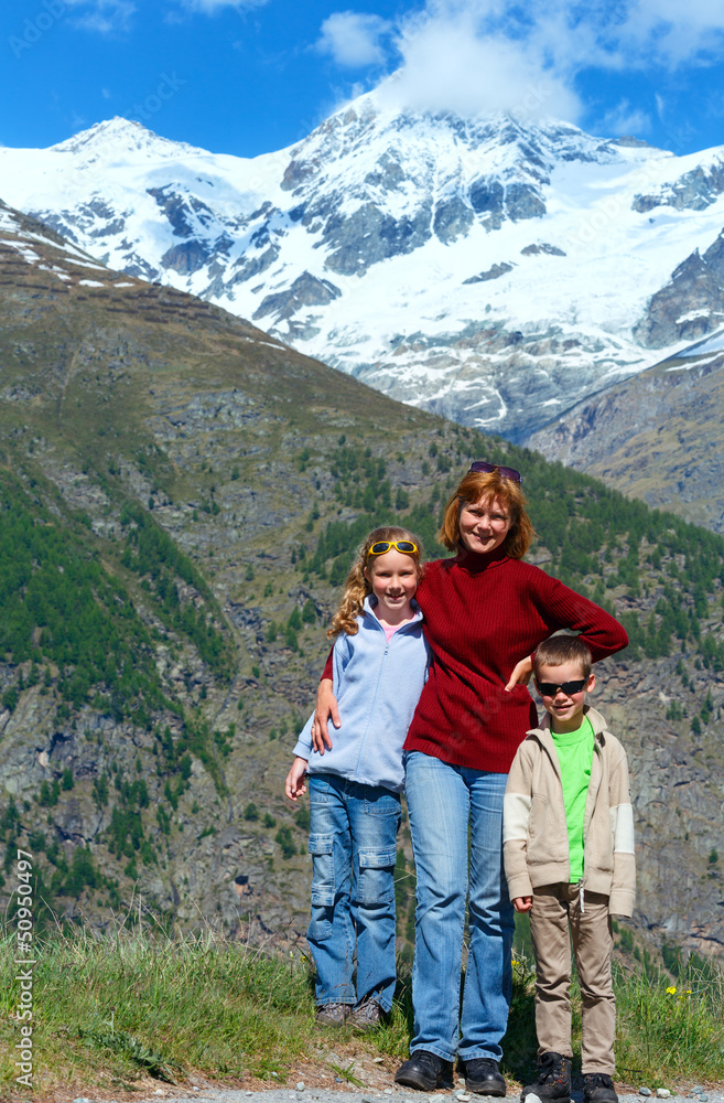 Family  on summer Alps mountain