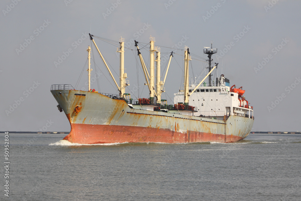 Old Ship for contain product in wide river. Old Ship for contain product in wide river.