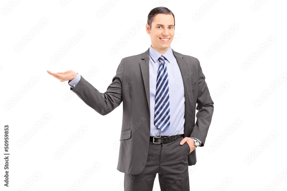 Young professional man in a suit gesturing with his hand Young professional man in a suit gesturing with his hand