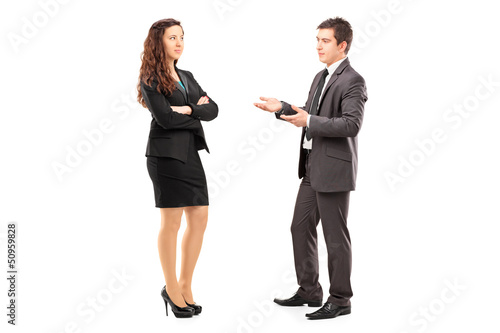 Full length portrait of a young businesspeople having a conversa