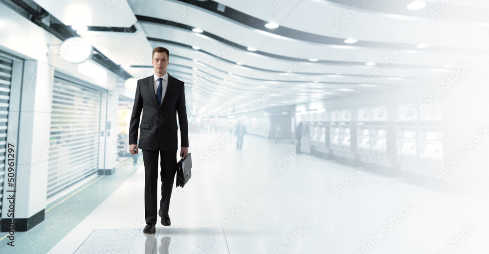 business man walking in subway business man walking in subway