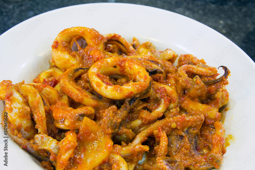 Nyonya Sambal Chili Calamari Dish Closeup Nyonya Sambal Chili Calamari Dish Closeup
