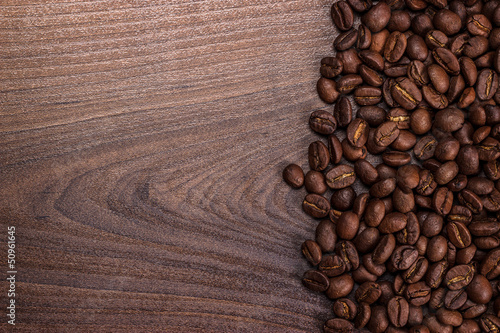 coffee beans on brown wooden background