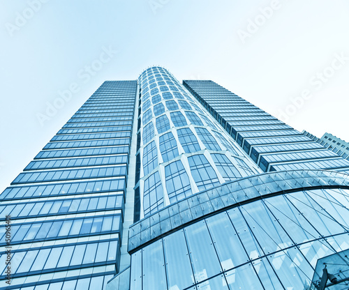 view to steel blue background of glass high rise building