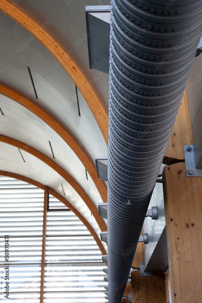Naklejka premium Industrial interior with metal pipe, urban