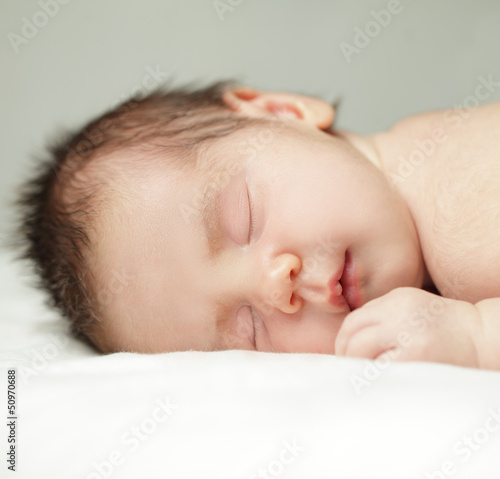 Newborn, sleeping baby close-up