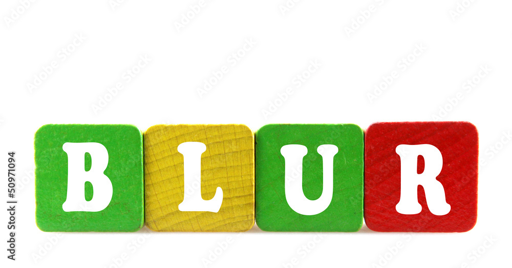 blur - isolated text in wooden building blocks blur - isolated text in wooden building blocks