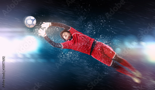 Fototapeta Naklejka Na Ścianę i Meble -  Goalkeeper catches the ball
