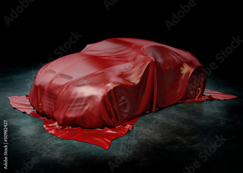 Sports car under cover