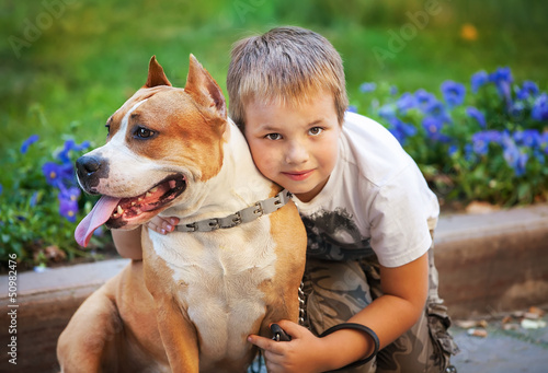 Happy young Boy and his dog