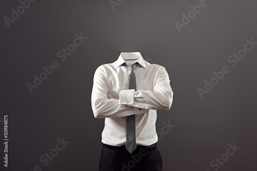 invisible man standing with folded arms