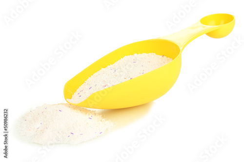 Washing powder in measuring cup isolated on white