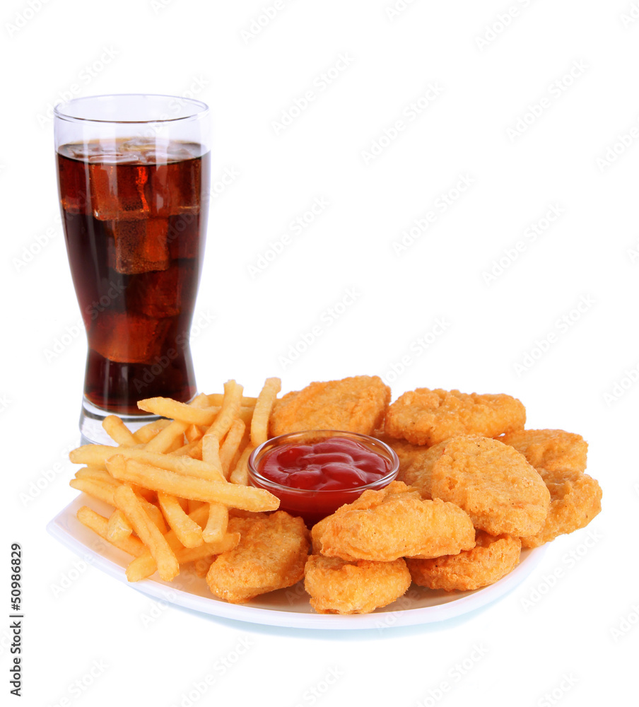 Fried chicken nuggets with french fries,cola and sauce isolated Fried chicken nuggets with french fries,cola and sauce isolated
